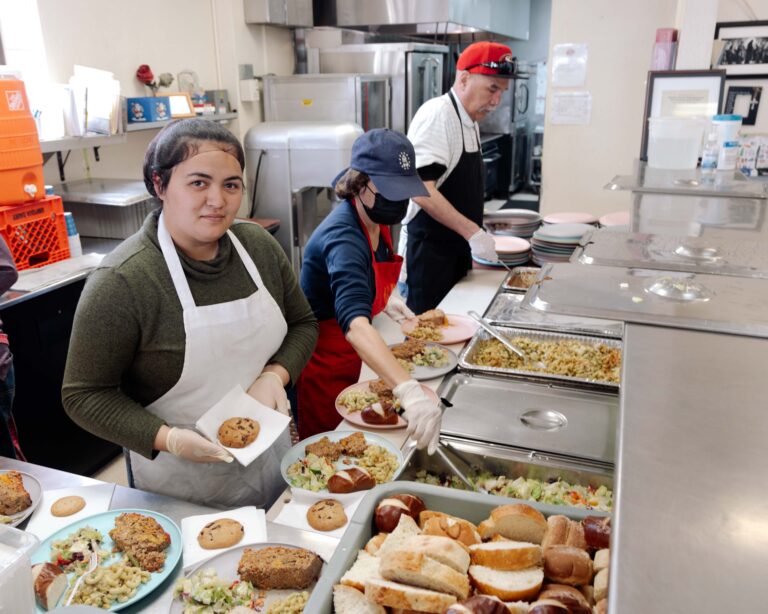 kitchen staff serving food